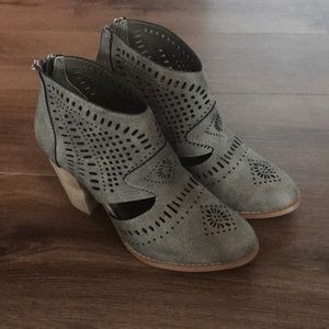 Green cut out booties with heel